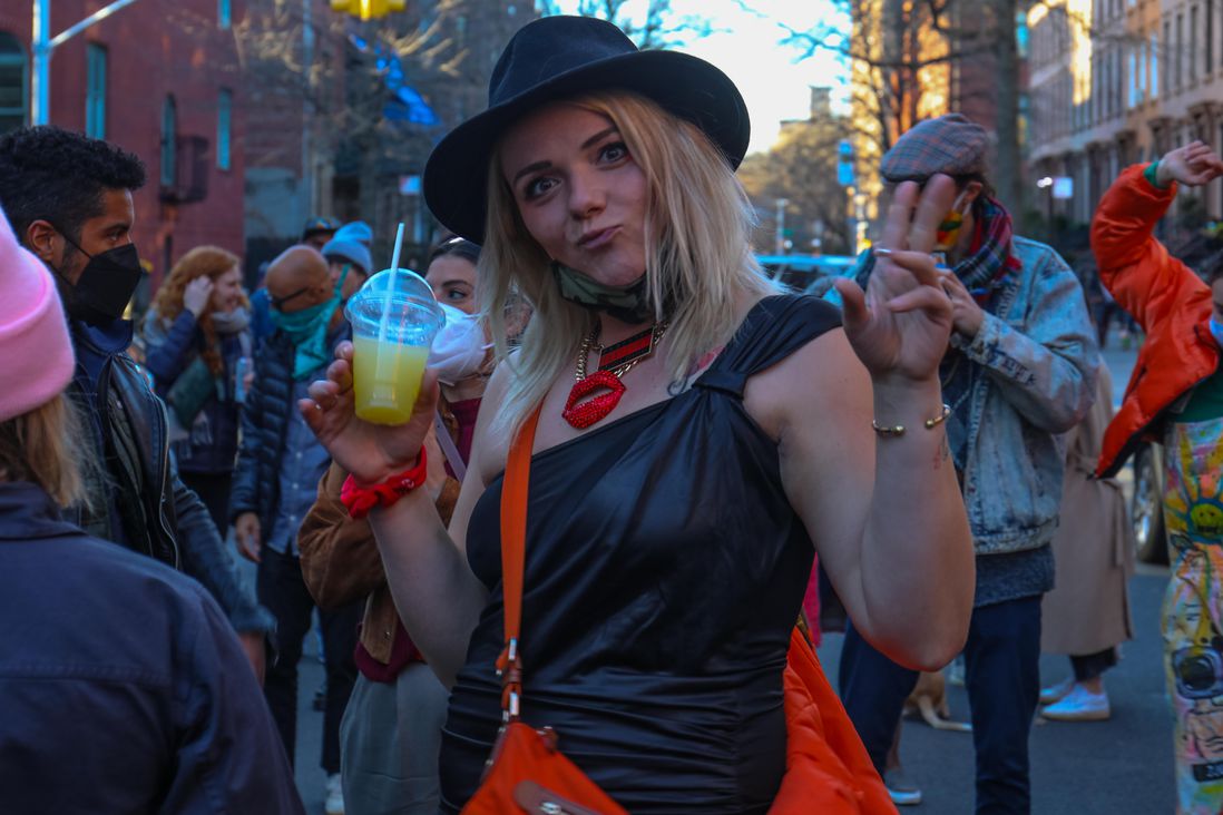 Photos of people partying at St. James Place block party anniversary on April 3rd, 2021